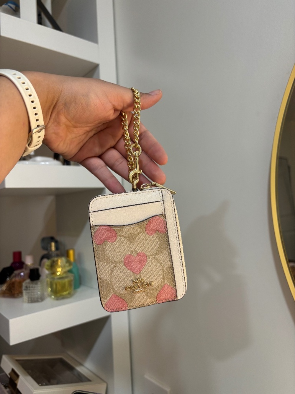 Coach Zip card wallet with heart print